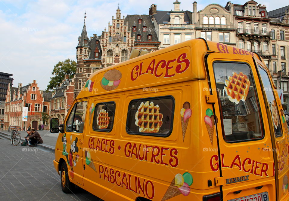 yellow van of a waffle maker on a Brussels street
