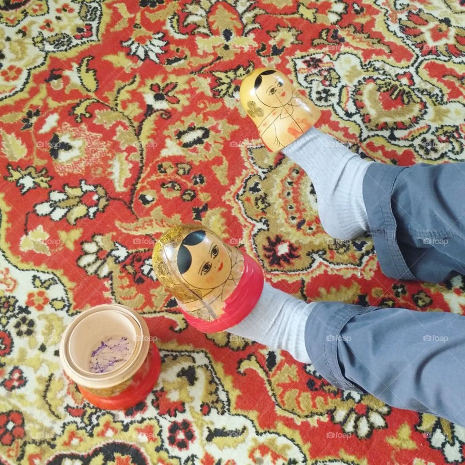 two Russian dolls on legs