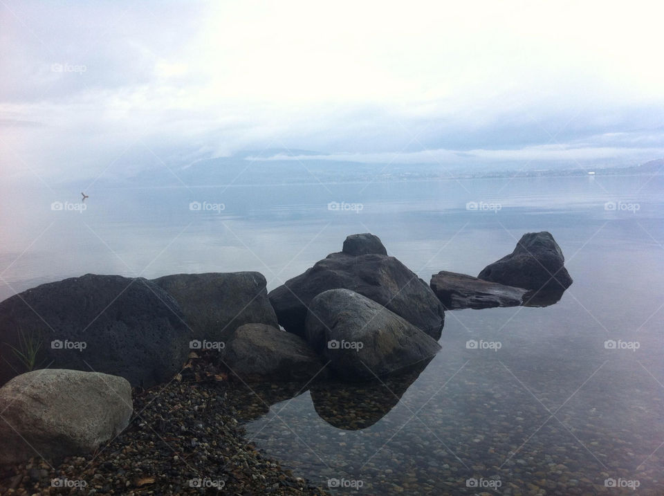 water lake rocks misty by redrock