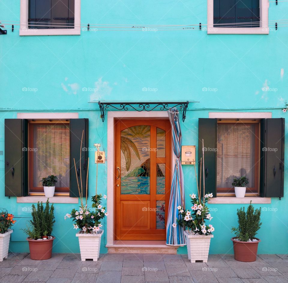 colored house with symmetrical windows