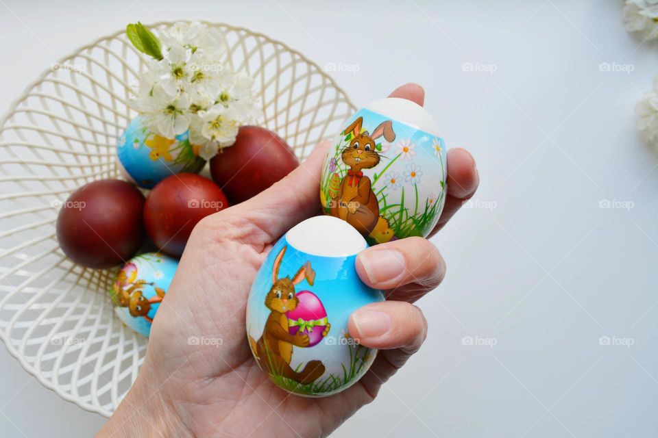 Easter eggs in the hand spring holiday