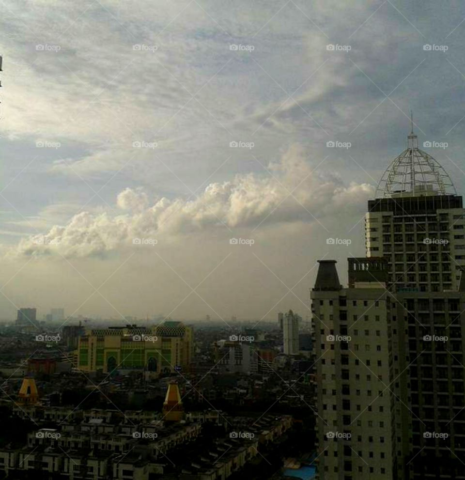 Clouds gathering above Jakarta city at 6.15 am