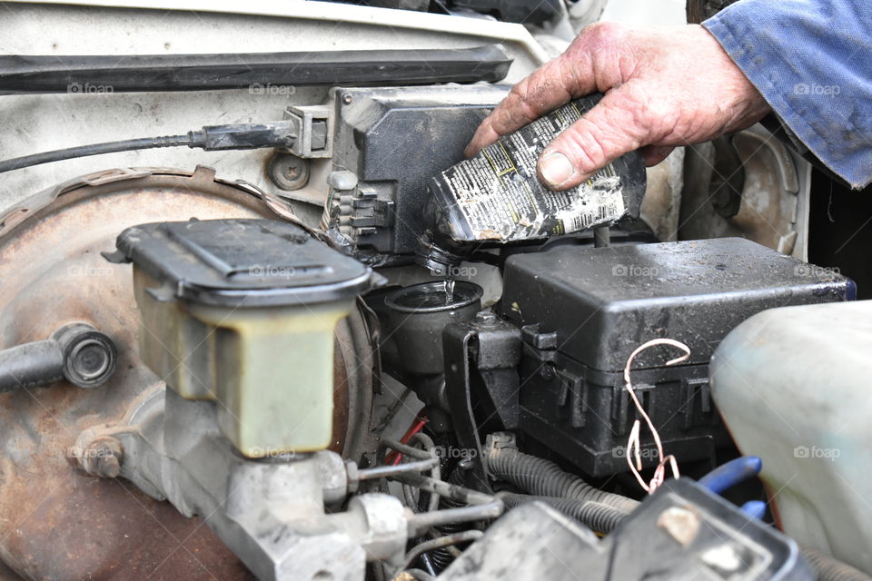 mechanic repairing a vehicle