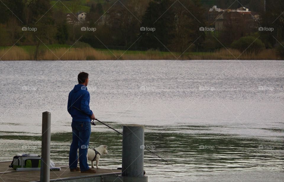Fisherman And Dog
