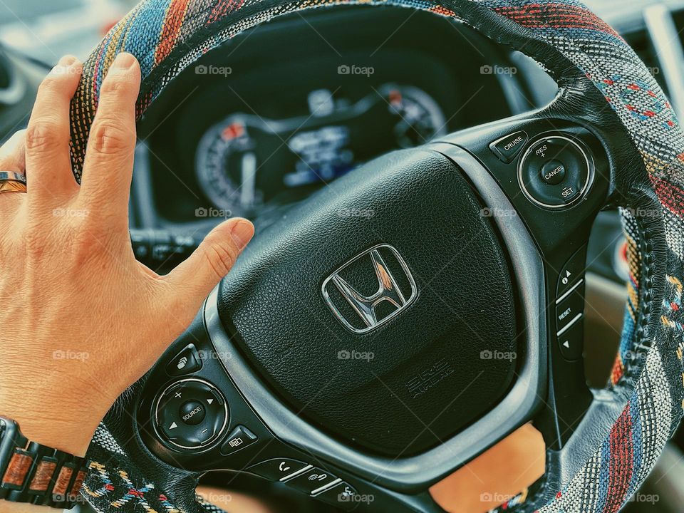 Woman driving Honda, woman’s hand on a steering wheel, woman’s hand driving a car, Honda Pilot steering wheel, daily routines 