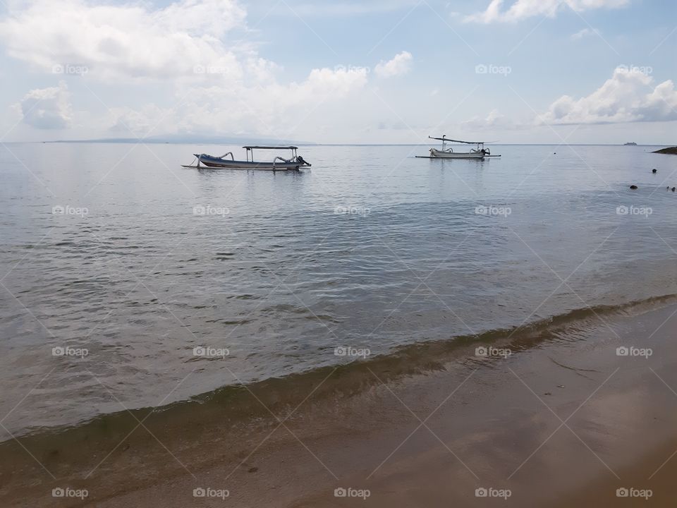 Fishing boats floating on the water