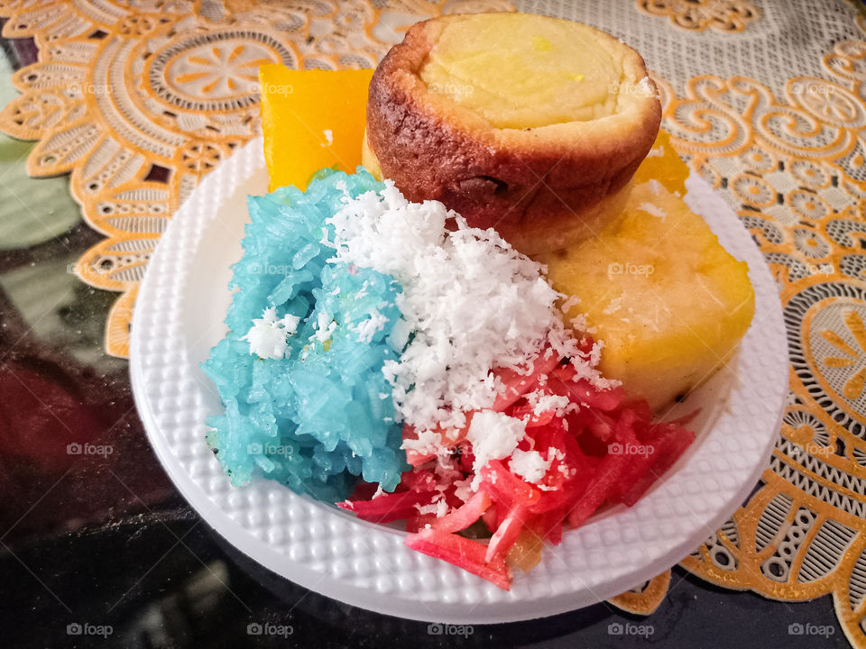 Indonesian traditional snacks made from cassava and sticky rice sprinkled with grated coconut