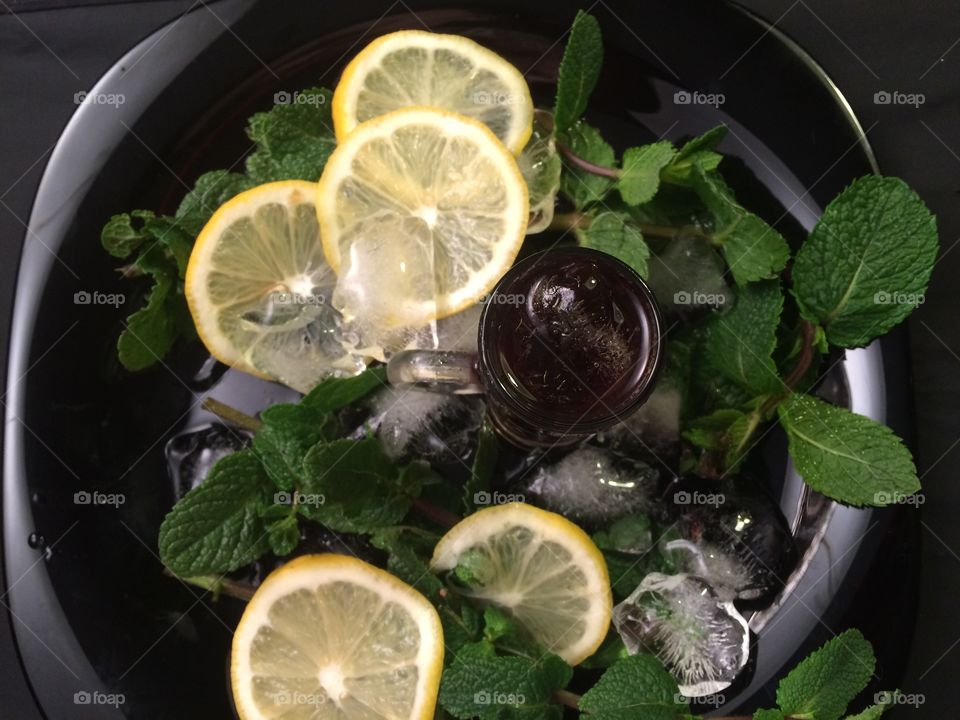 Drink. Lemon. Mint. Ice cubes