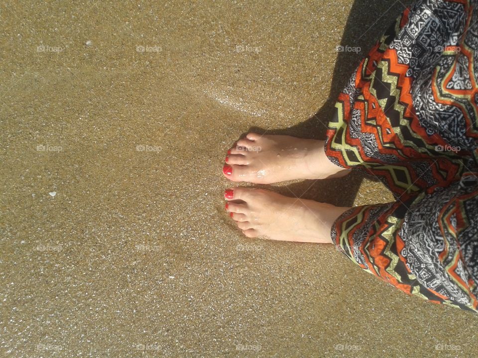 Beach and foot , always a good mix