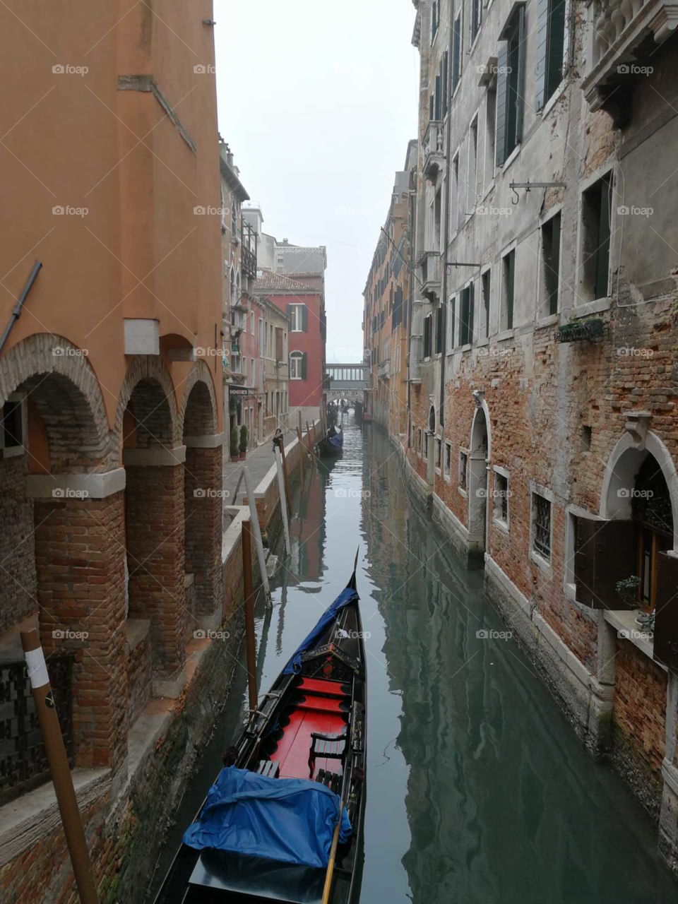 canal in venice with gondola