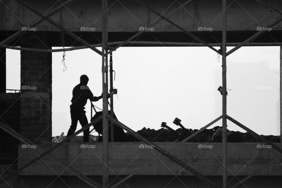 a man at work under construction site