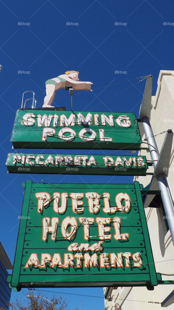 Pueblo hotel vintage sign