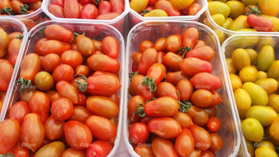 red tomatoes for sale at market