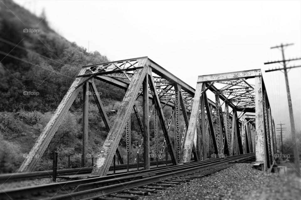 Train bridge . Train bridge over a river in black and white


