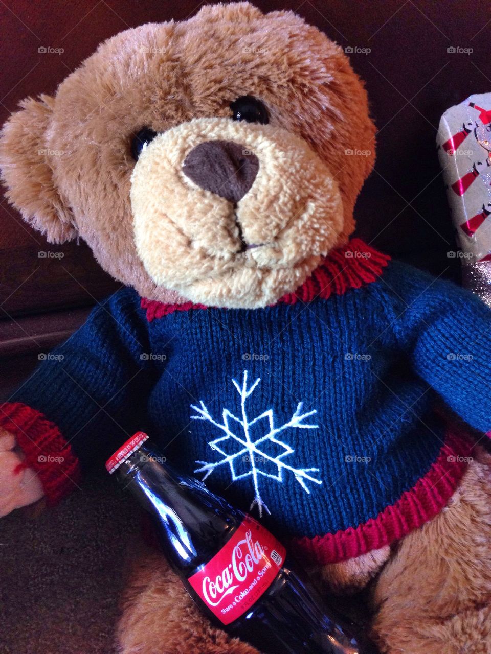 Teddy bear and coca-cola.