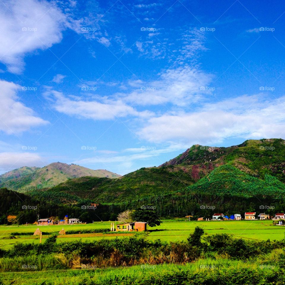 Mountain in central vietnam. View from inside a train in central vietnam