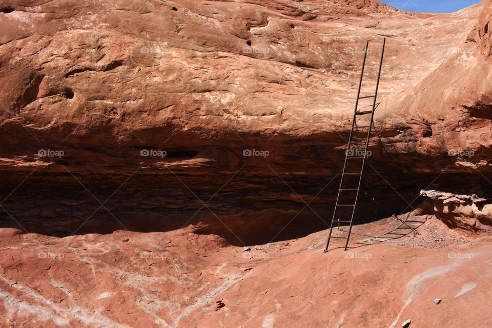 A ladder between rock shelves on a Canyonlands, Utah trail.