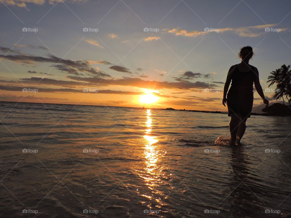 Beach on feet! . Sunset walk on beach in Maui!