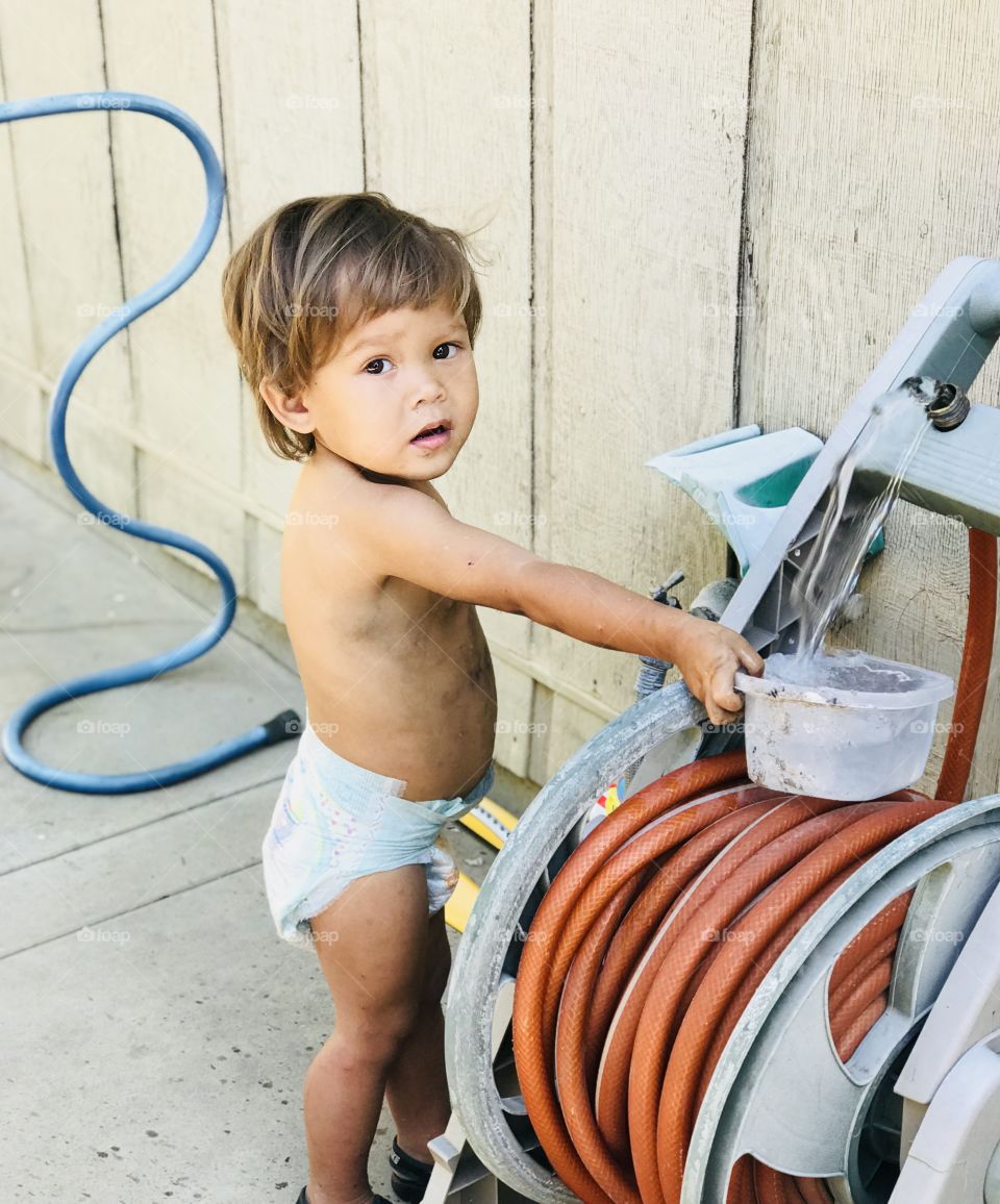 Andrew was playing in the backyard 