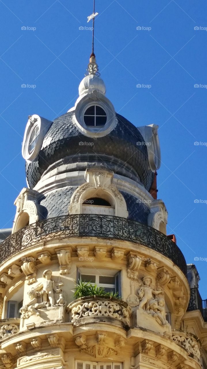 windows of a historical building in Montpellier, France