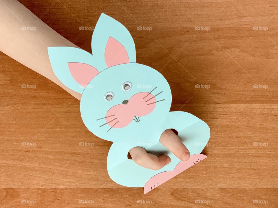 Easter paper rabbit, creative with kid, child hand