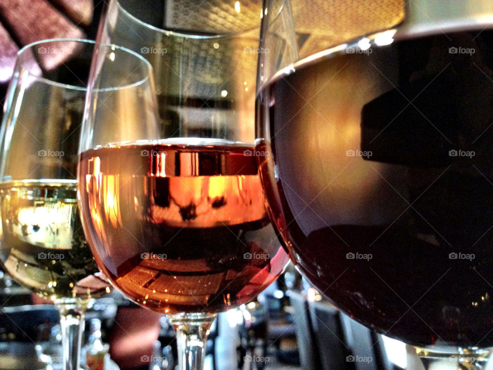 Red, rose and white wine on restaurant table