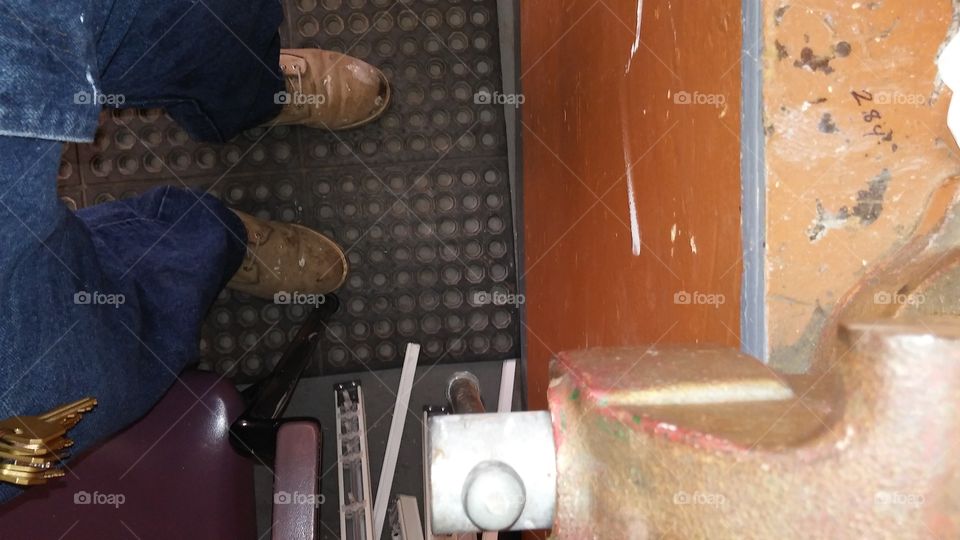 standing in front of my workbench at work