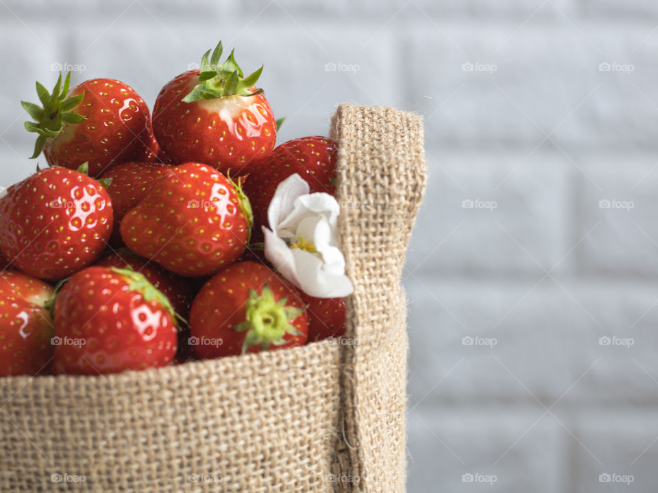 Strawberries in a jute bag