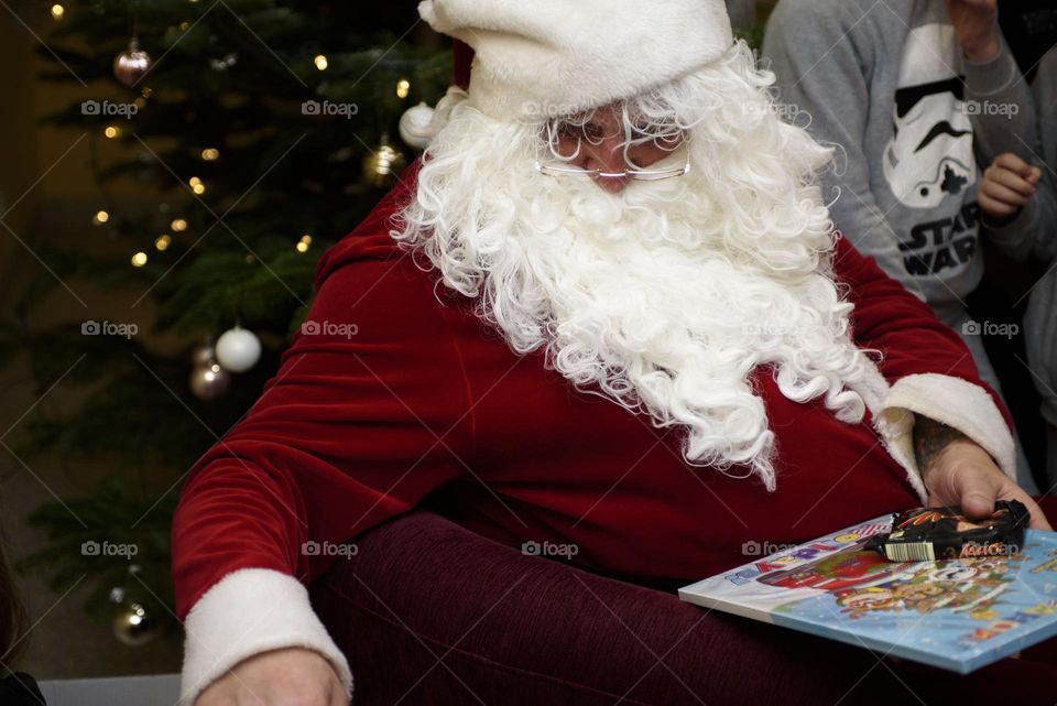 St.  Nikolay gives gifts to children at the holiday.