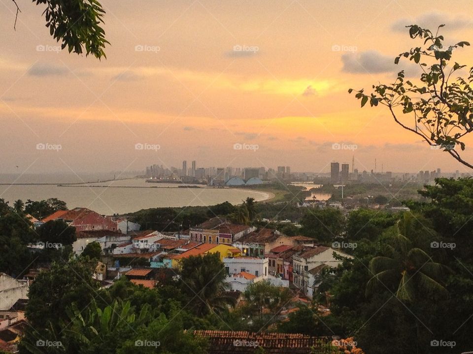 The sun is setting on Olinda and Recife