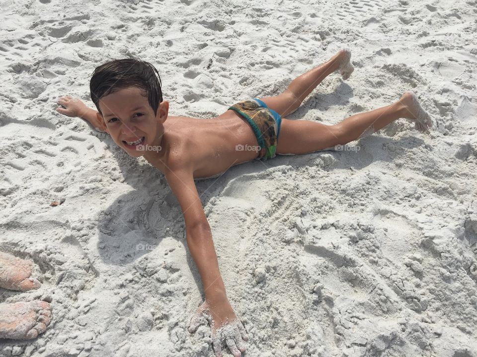 Boy in the sand