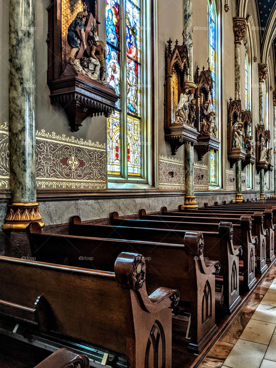 church pews and stained glass windows