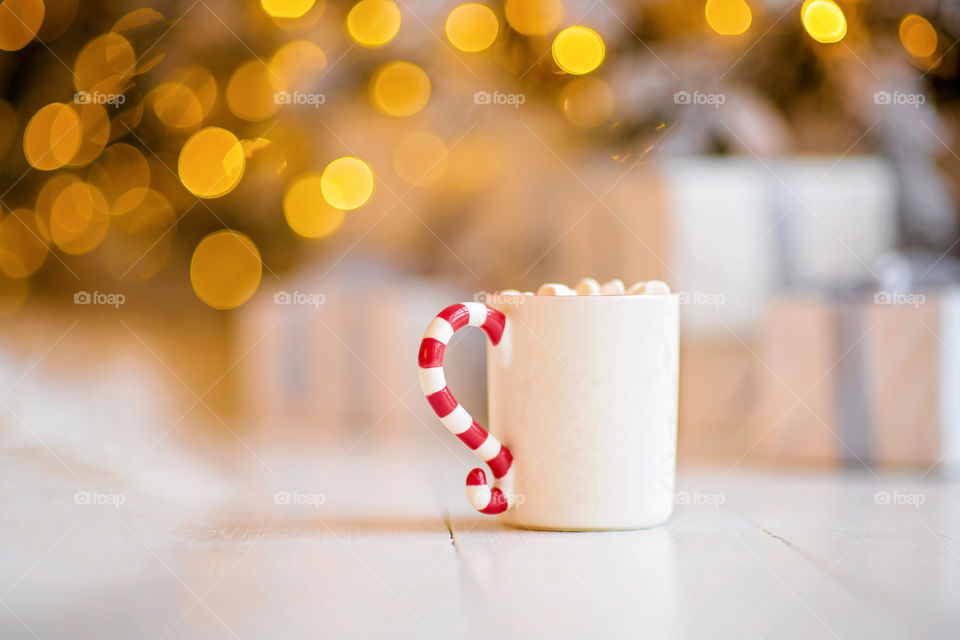 cup of coffee in a cozy festive Christmas atmosphere