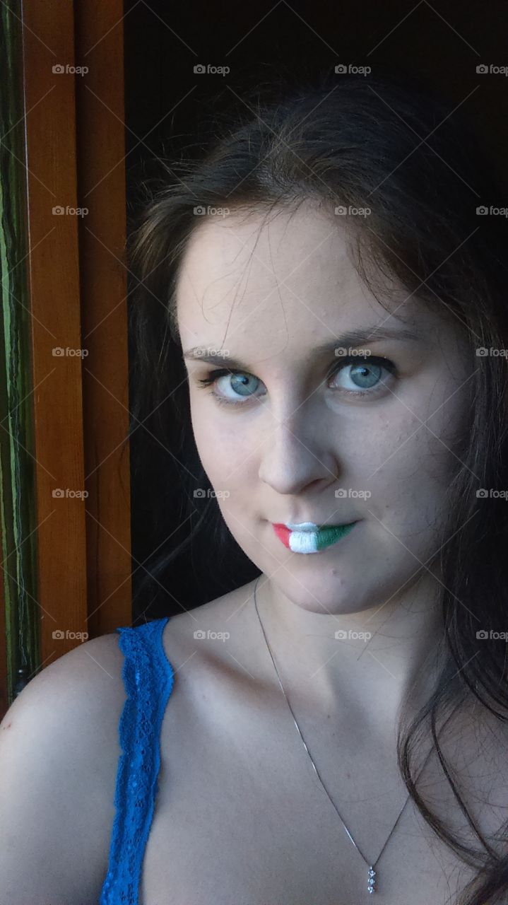 Painted italian flag on woman's lips