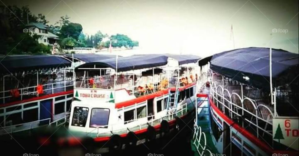 Colourful ferry boats at Lake Toba Indonesia