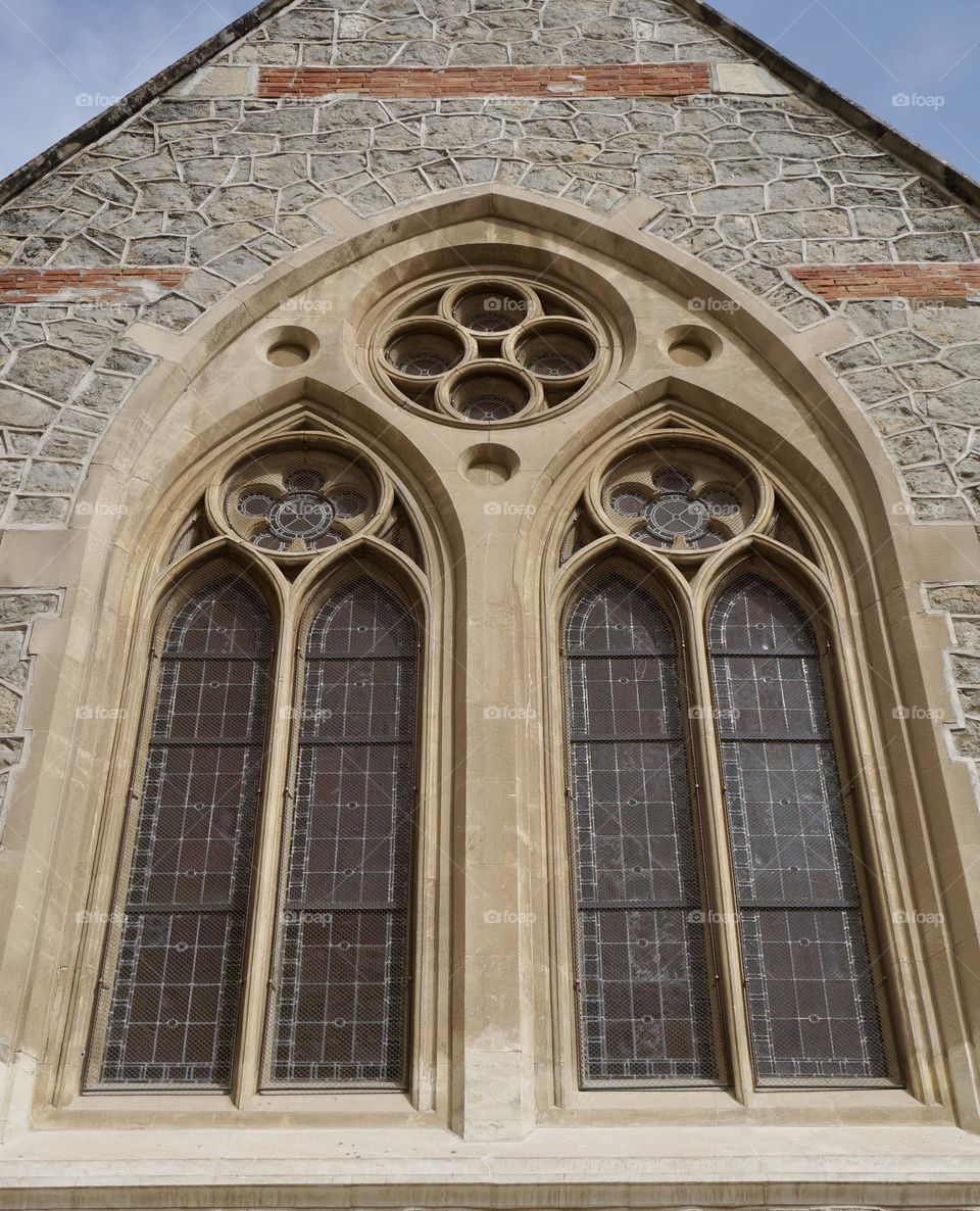 Circular rosettes in an old church window.