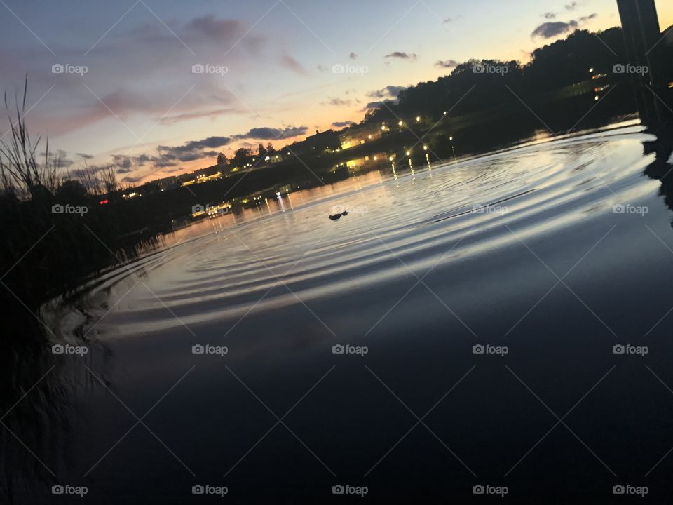 Sunset at a Lake in Michigan, stone in the water 