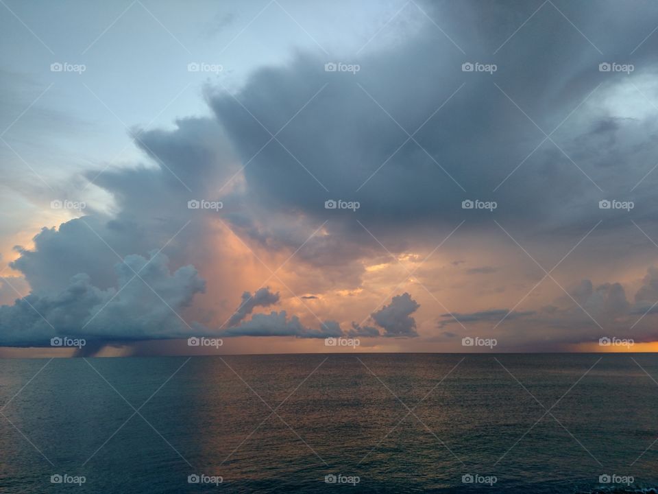 Sunset glow in storm clouds.