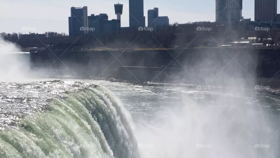 view from the falls. American side of Niagara Falls NY. Chilly and breezy with ice and snow still all around