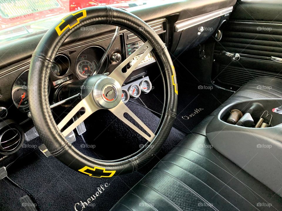 Cars with soul - The beautiful and neat interior of a Chevrolet chevelle showing all the gauges that the driver monitors during travels