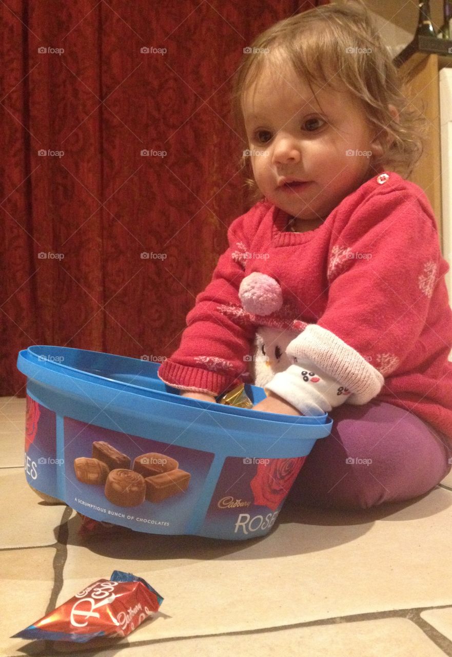 Toddler with chocolate at Christmas