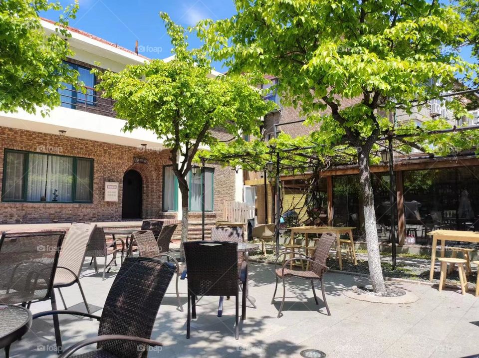 This is a the courtyard of a coffee shop.
