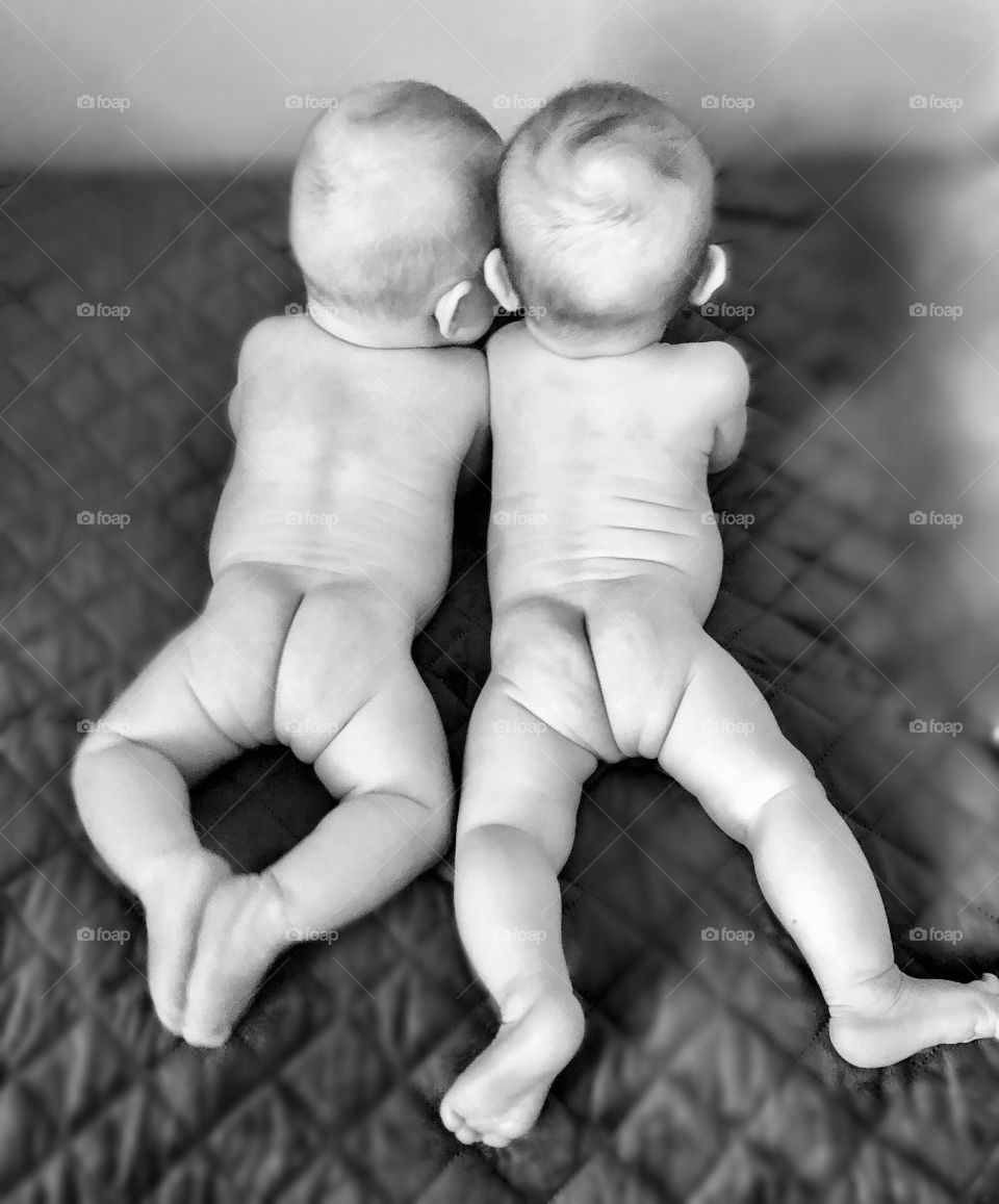 Cute twins baby butts