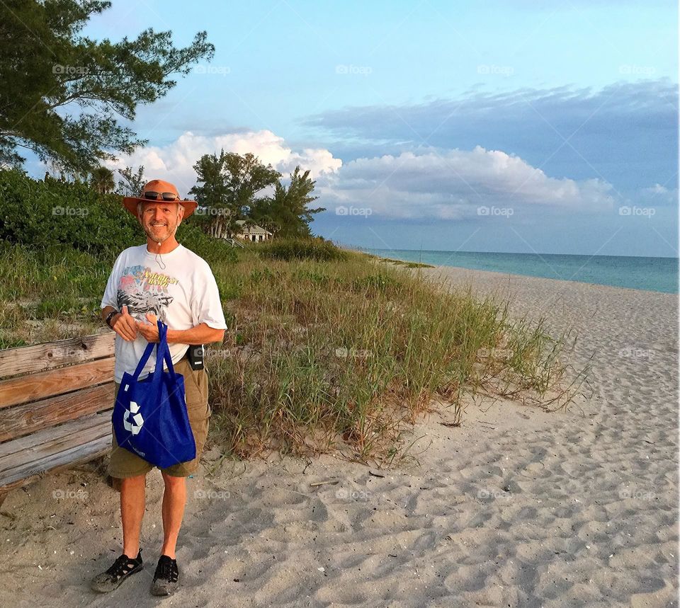 Father on vacation enjoying the beach.