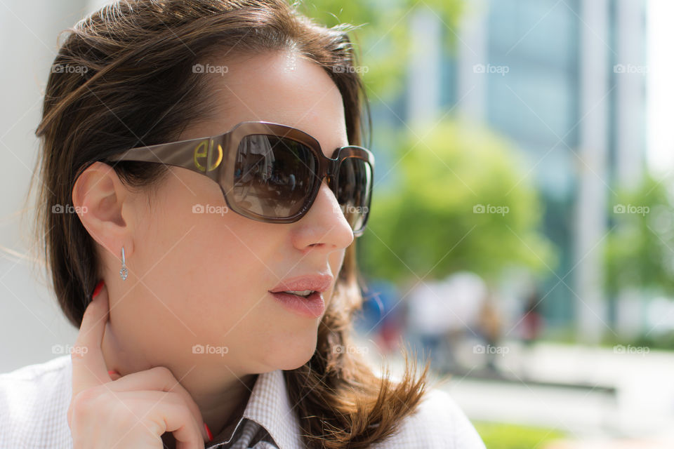 Young woman wearing sunglasses