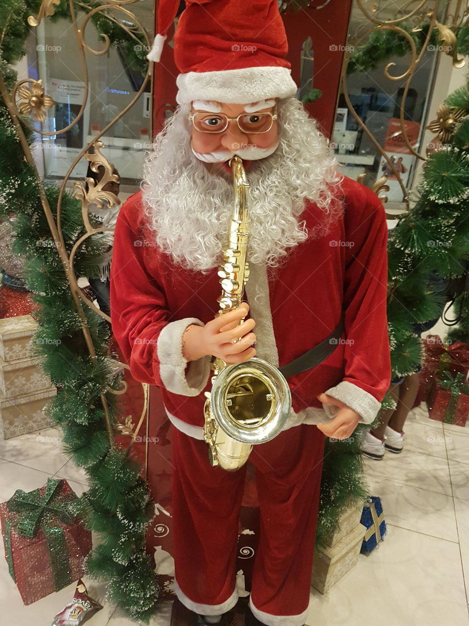 In Kenya we don't have people dressing up as Santa, so when it is Christmas people look forward to going to the mall because of all the decorations including Santa.Christmass means a trip to the mall to see decorations and take pictures.