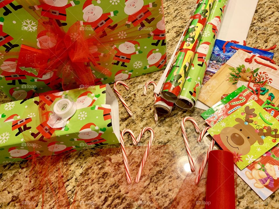 Christmas wrapping, candy canes and Christmas music getting ready for Santa!