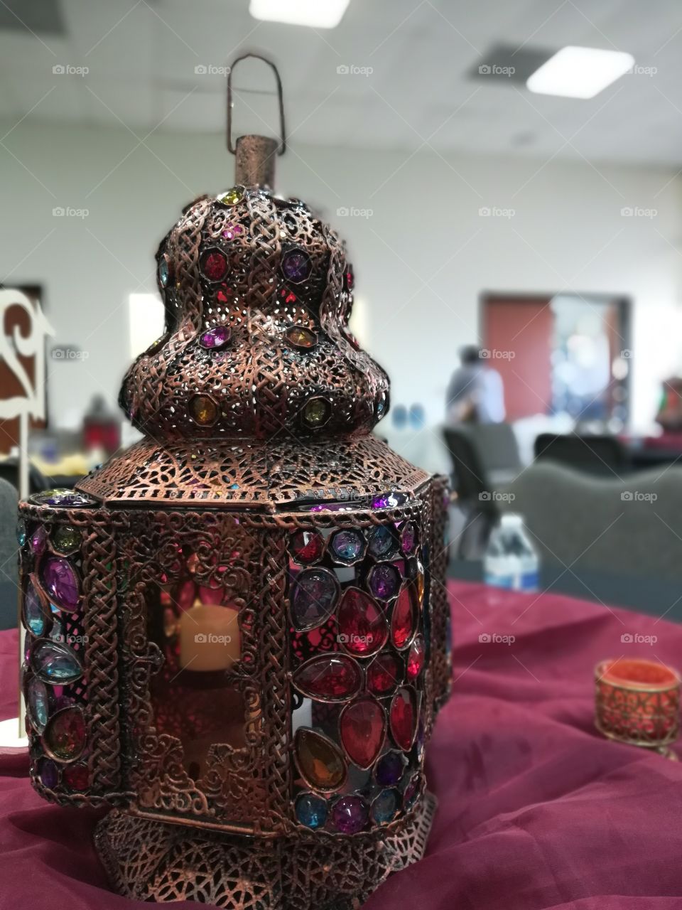 Elegant and colorful lantern used to brighten up any event, place, or even your house. The jewels glisten in the sun and the lights shine from within.