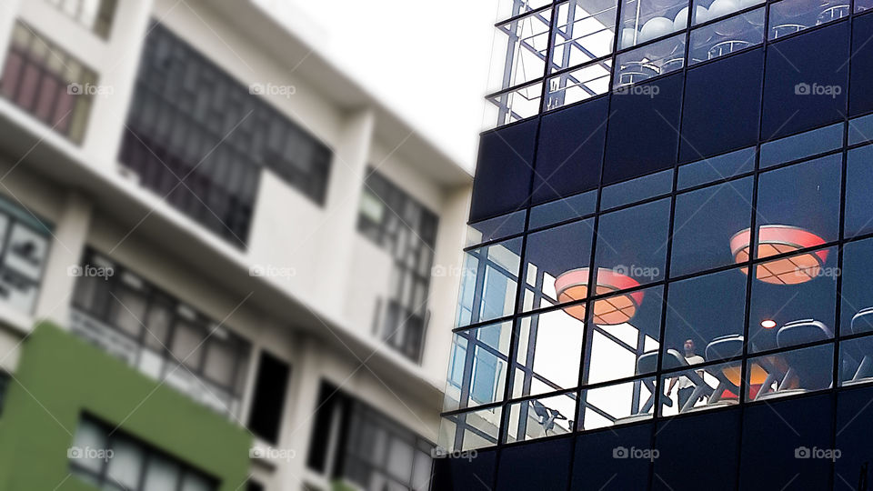 Low angle view of closed glass window