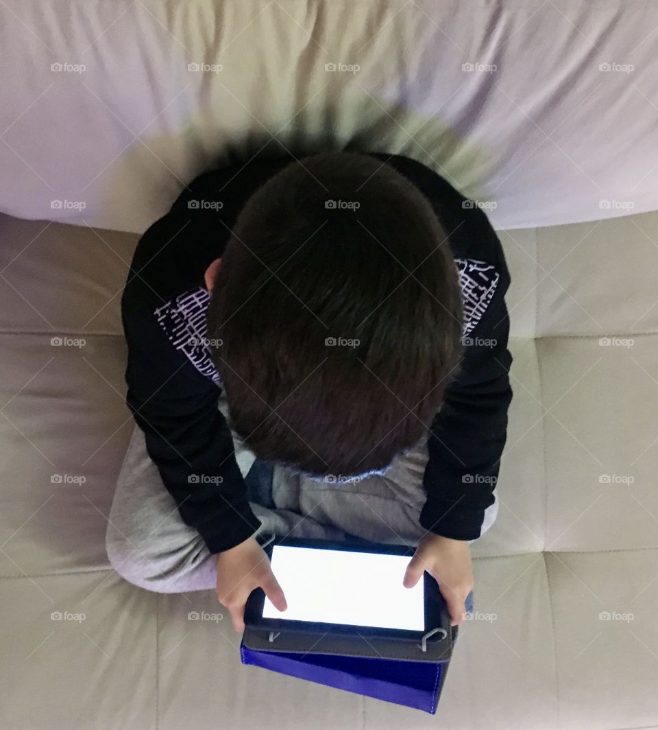 Boy playing video game